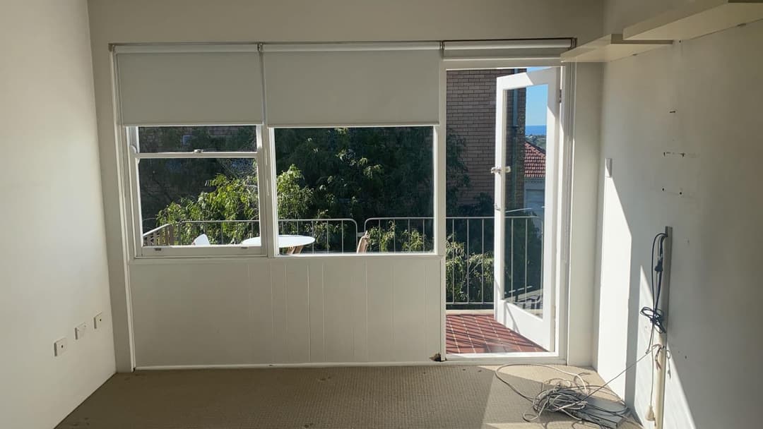 Apartment Balcony Door and Window, Ocean Glimpse