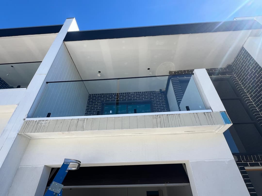 Glass Balustrade Balcony, Dark Brick New Development