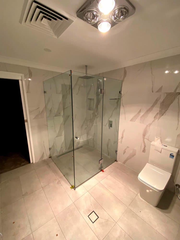 Frameless shower screen installation